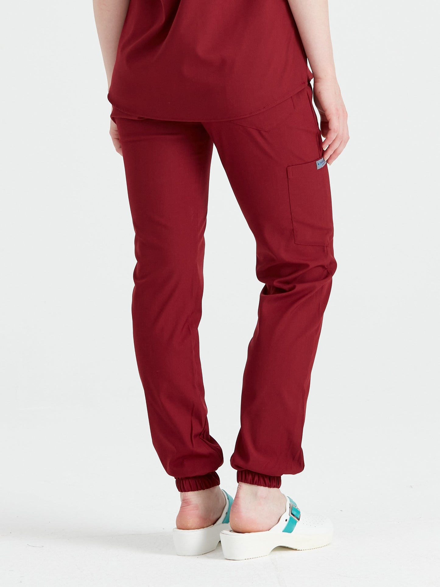 Unisex medical pants, burgundy - Model Activity