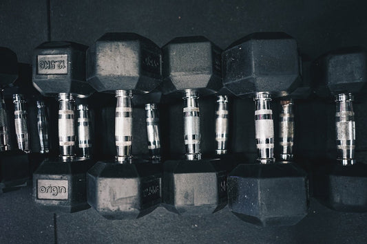 a row of dumbs sitting next to each other