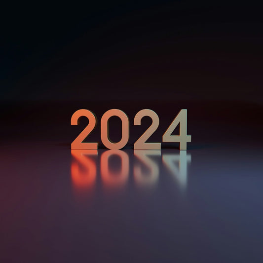 a dark background with the numbers 2012 and a reflection on the floor