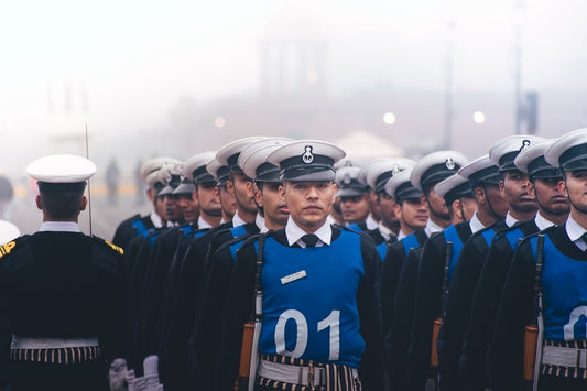 A group of uniformed men standing next to each other