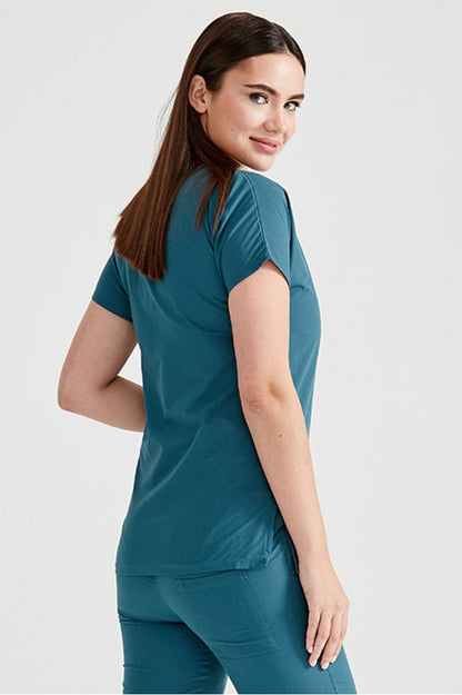 Asistenta medicala imbracata in costum medical de dama din elastan, verde petrol, vedere din spate