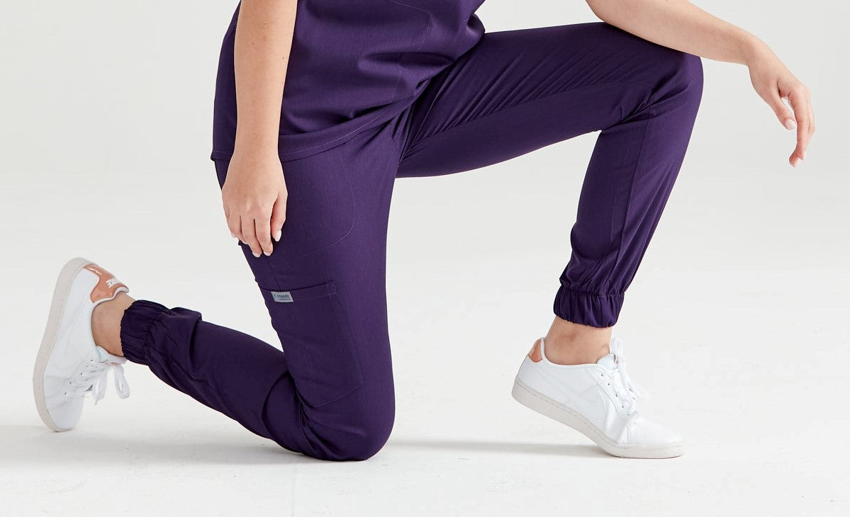 Unisex medical pants, purple - Model Activity